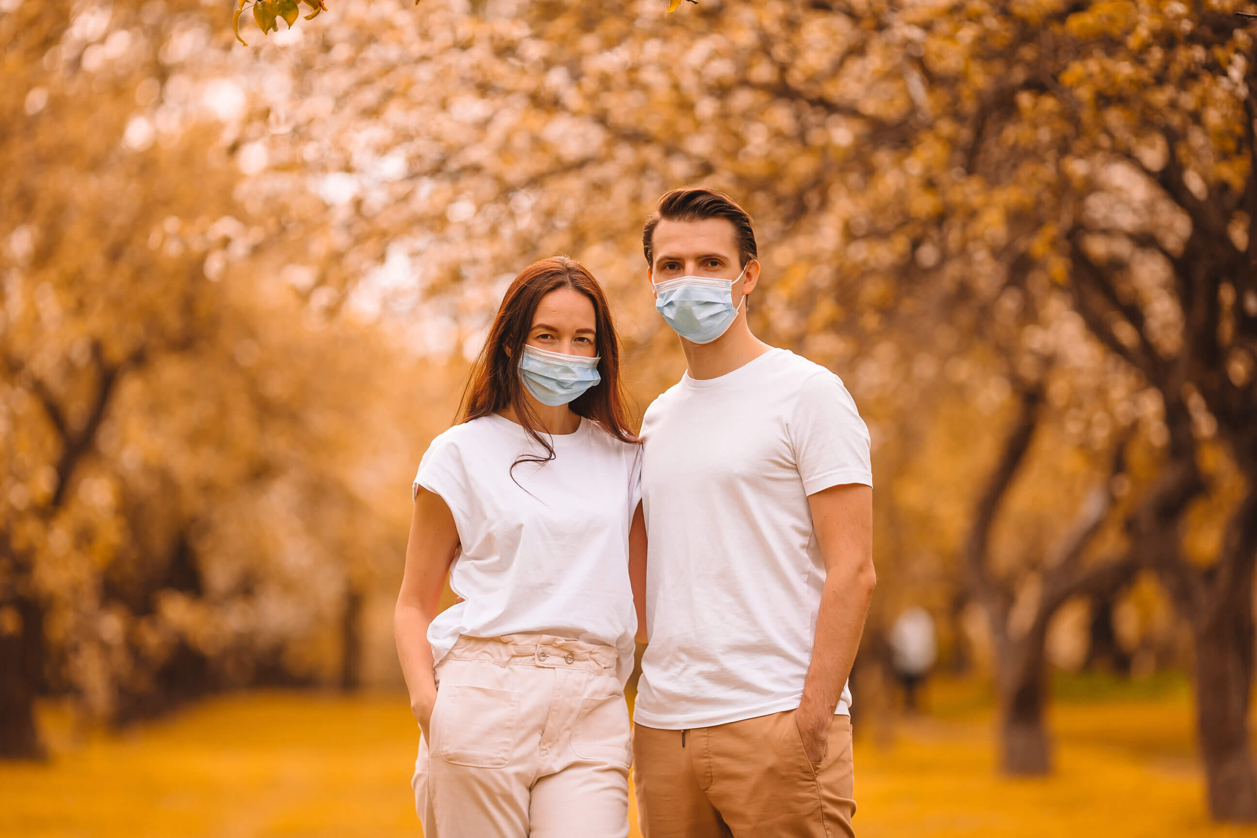 a couple after a sex date wearing masks